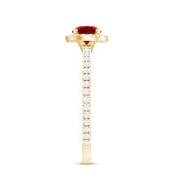 Lab created ruby and diamond halo engagement ring by Rosec Jewels featuring a 0.6 carat center stone and intricate band design.