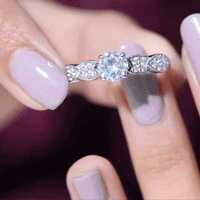 Classic Round Zirconia Engagement Ring with Side Stones