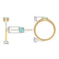 Rosec Jewels aquamarine solitaire engagement ring with diamond, featuring a designer ring setting and a prominent aquamarine gemstone.