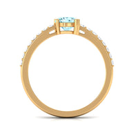Rosec Jewels aquamarine solitaire engagement ring with diamond, featuring a sleek band and a prominent aquamarine gemstone.