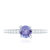 Certified real Tanzanite promise ring with sparkling diamonds from Rosec Jewels, featuring a vibrant blue gemstone set in a silver band.