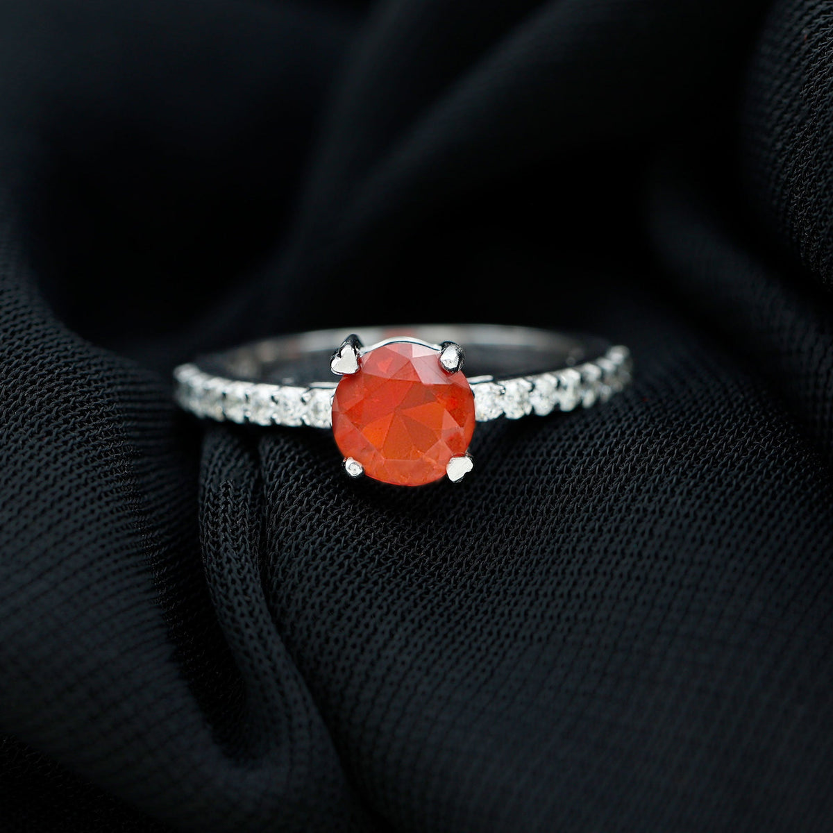 Rosec Jewels designer fire opal promise ring with diamond accents, showcasing vibrant orange gemstone and elegant band design.