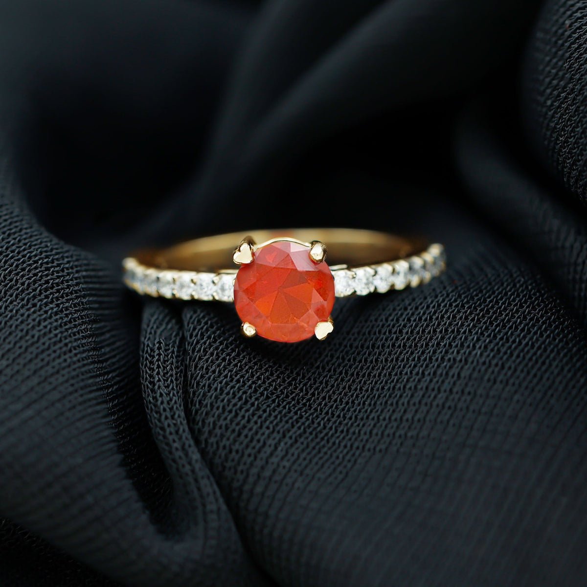 Rosec Jewels designer fire opal promise ring with diamond accents, featuring a vibrant orange gemstone and sparkling details.