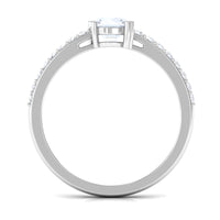 Natural moonstone solitaire promise ring with a diamond accent, featuring a sleek band from Rosec Jewels.