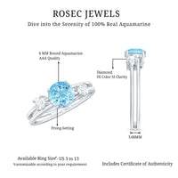 Three-stone aquamarine and diamond engagement ring with double band shank by Rosec Jewels, showcasing sparkling gemstones and elegant design.