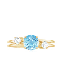 Three-stone aquamarine and diamond engagement ring with double band shank by Rosec Jewels, showcasing sparkling gemstones and intricate design.