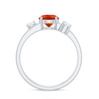 Double band engagement ring by Rosec Jewels featuring a fire opal center stone and diamond accents on a sleek gold band.