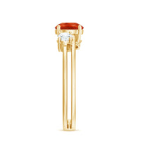 Double band engagement ring by Rosec Jewels featuring a vibrant fire opal center and sparkling diamonds.