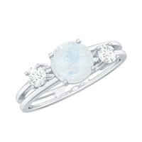 Rosec Jewels 1/2 CT moonstone solitaire double band ring with diamond accents, showcasing a polished silver finish and intricate design.