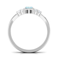 Natural emerald cut aquamarine and diamond marriage ring set by Rosec Jewels, featuring elegant gemstone and band details.