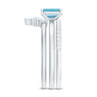 Set of three emerald cut aquamarine solitaire rings with diamond accents by Rosec Jewels, showcasing elegant gemstone jewelry.