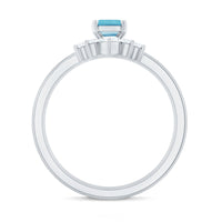 Set of three Rosec Jewels emerald cut aquamarine solitaire rings with diamonds, showcasing elegant gemstone and metal band details.