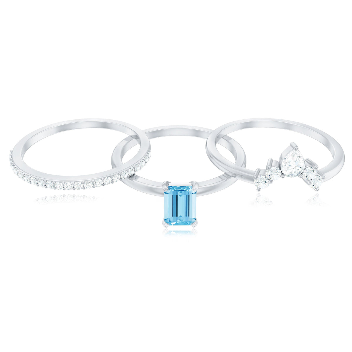 Set of three Rosec Jewels emerald cut aquamarine solitaire rings with diamond accents, showcasing elegant gemstone and metal design.