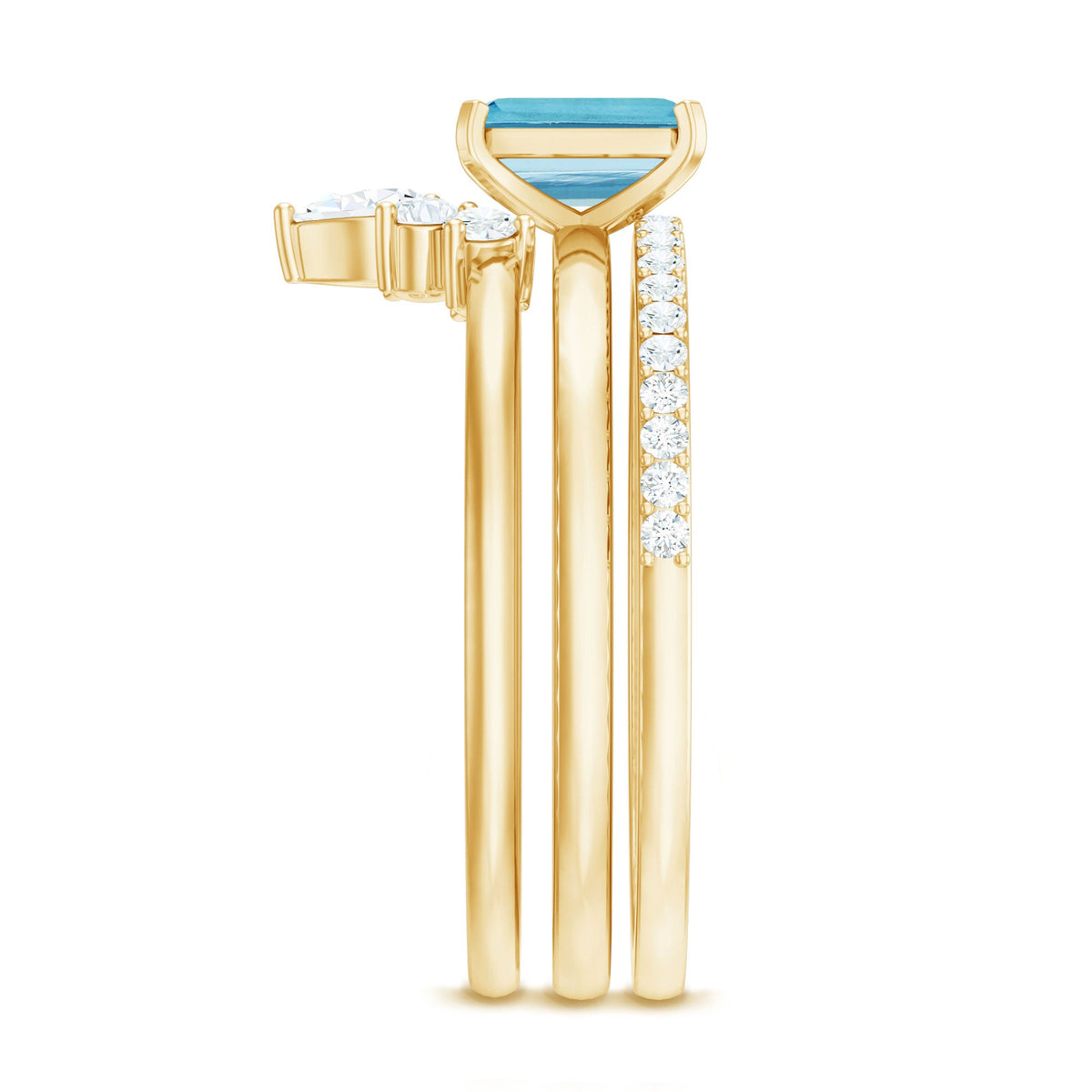 Set of three emerald cut aquamarine solitaire rings with diamond accents by Rosec Jewels, showcasing elegant gemstone jewelry.