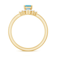 Set of three rose gold aquamarine solitaire rings with emerald cut stones and diamond accents by Rosec Jewels.