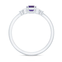 Emerald cut 1.4 carat amethyst engagement ring with diamond accents from Rosec Jewels, featuring a silver band and intricate detailing.