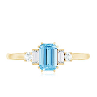 Emerald cut aquamarine engagement ring with diamond accents from Rosec Jewels, showcasing the gemstone and elegant band design