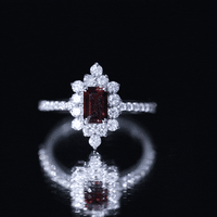 Vintage Inspired Garnet Emerald Cut Engagement Ring with Diamond Halo