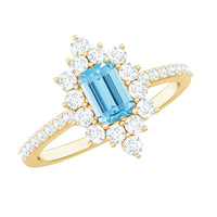 Vintage aquamarine and diamond halo engagement ring by Rosec Jewels, featuring intricate design and sparkling gemstone details.