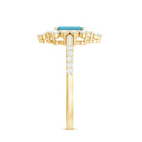 Vintage-looking aquamarine and diamond halo engagement ring from Rosec Jewels with intricate detailing and elegant setting.