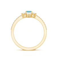 Vintage-looking aquamarine and diamond halo engagement ring by Rosec Jewels, featuring intricate design and sparkling gemstones.