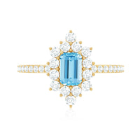 Vintage style aquamarine and diamond halo engagement ring from Rosec Jewels, showcasing intricate design and sparkling gemstones.
