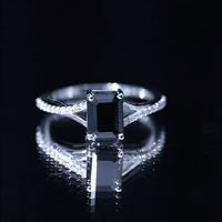 Lab grown 1.6 carat black diamond engagement ring with white diamond accents, emerald cut, split shank design by Rosec Jewels.