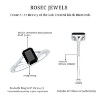 Lab grown black diamond emerald cut engagement ring with white diamond split shank from Rosec Jewels, showcasing the elegant design.