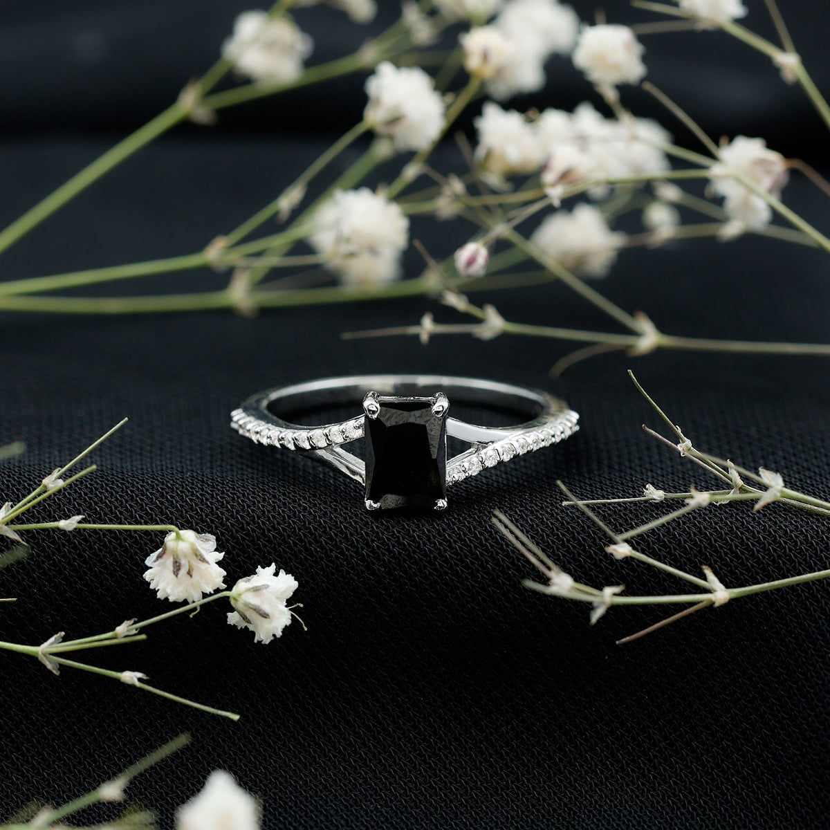 Certified 1.6 carat lab-grown black diamond engagement ring with emerald cut and white diamond split shank by Rosec Jewels.