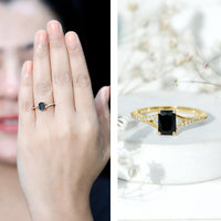 Lab grown black diamond engagement ring with white diamonds, emerald cut, split shank design by Rosec Jewels.