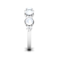 Genuine moonstone and diamond half eternity ring by Rosec Jewels featuring alternating moonstone and diamond accents in a silver band.