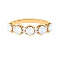 Genuine moonstone and diamond half eternity ring by Rosec Jewels, showcasing sparkling gemstones in a sleek band.