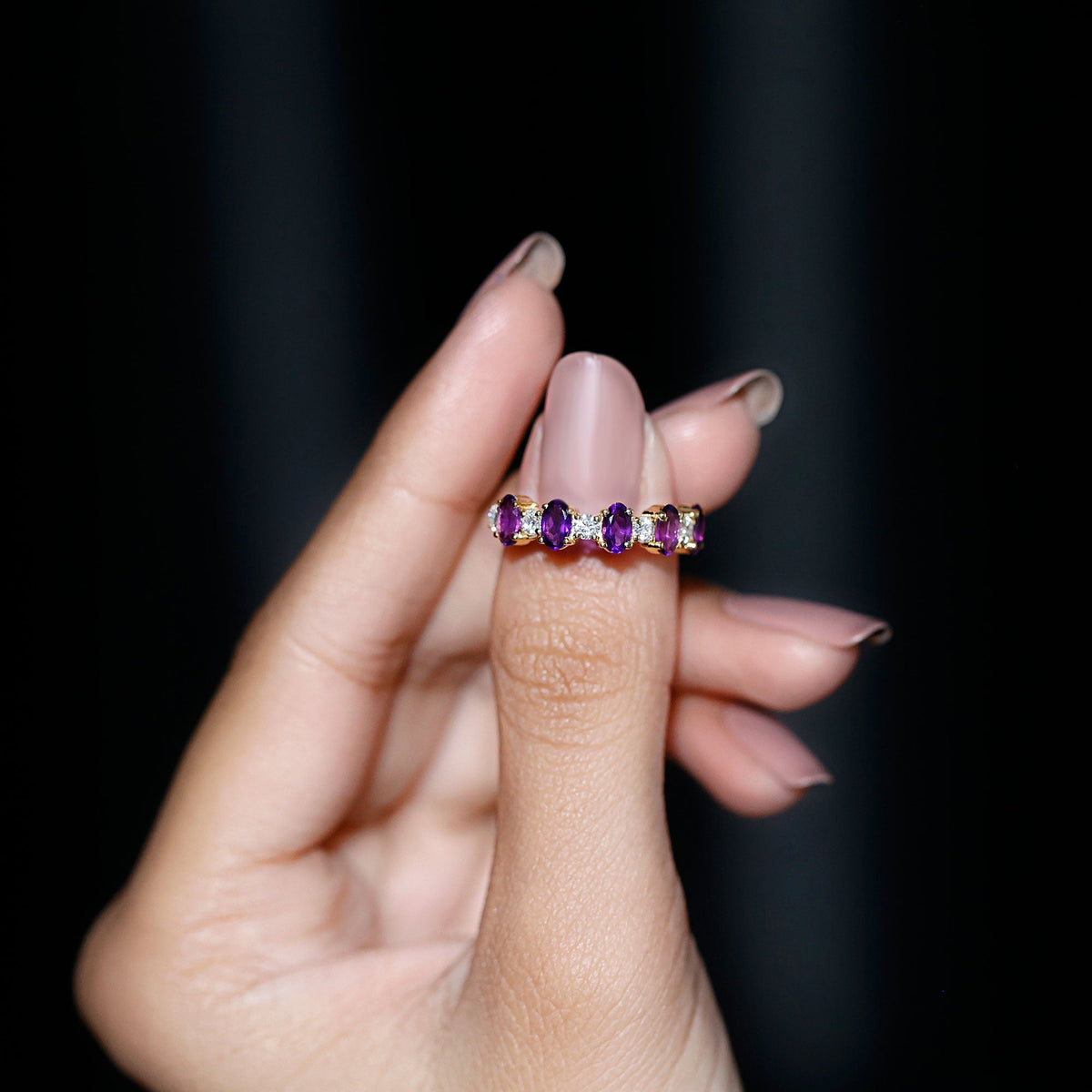 Natural oval amethyst diamond half eternity ring for women with rose gold setting, featuring alternating amethyst and diamond stones.