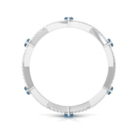 Marquise London Blue Topaz Crossover Eternity Band with Diamond