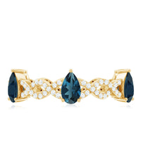 Pear Shape London Blue Topaz Crossover Eternity Band with Diamond