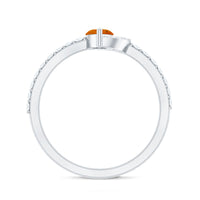 Minimal Marquise Fire Opal and Diamond Engagement Ring featuring a marquise fire opal center stone with sparkling diamonds on a sleek band.