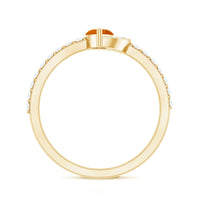 Minimal Marquise Fire Opal and Diamond Engagement Ring by Rosec Jewels, featuring a marquise fire opal and sparkling diamonds.