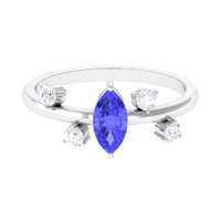 Rosec Jewels 1 CT Marquise Tanzanite minimal solitaire ring with scatter diamonds, featuring a marquise-shaped tanzanite gemstone.