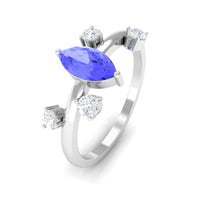 Rosec Jewels 1 CT marquise tanzanite solitaire ring with scatter diamonds, showcasing a sleek gold band and sparkling gemstone.
