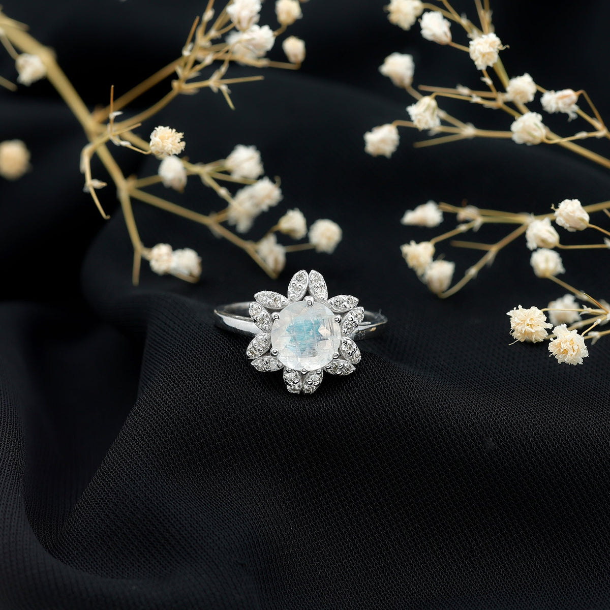 Rosec Jewels 0.85 CT moonstone and diamond floral halo engagement ring with intricate design and sparkling gemstones.