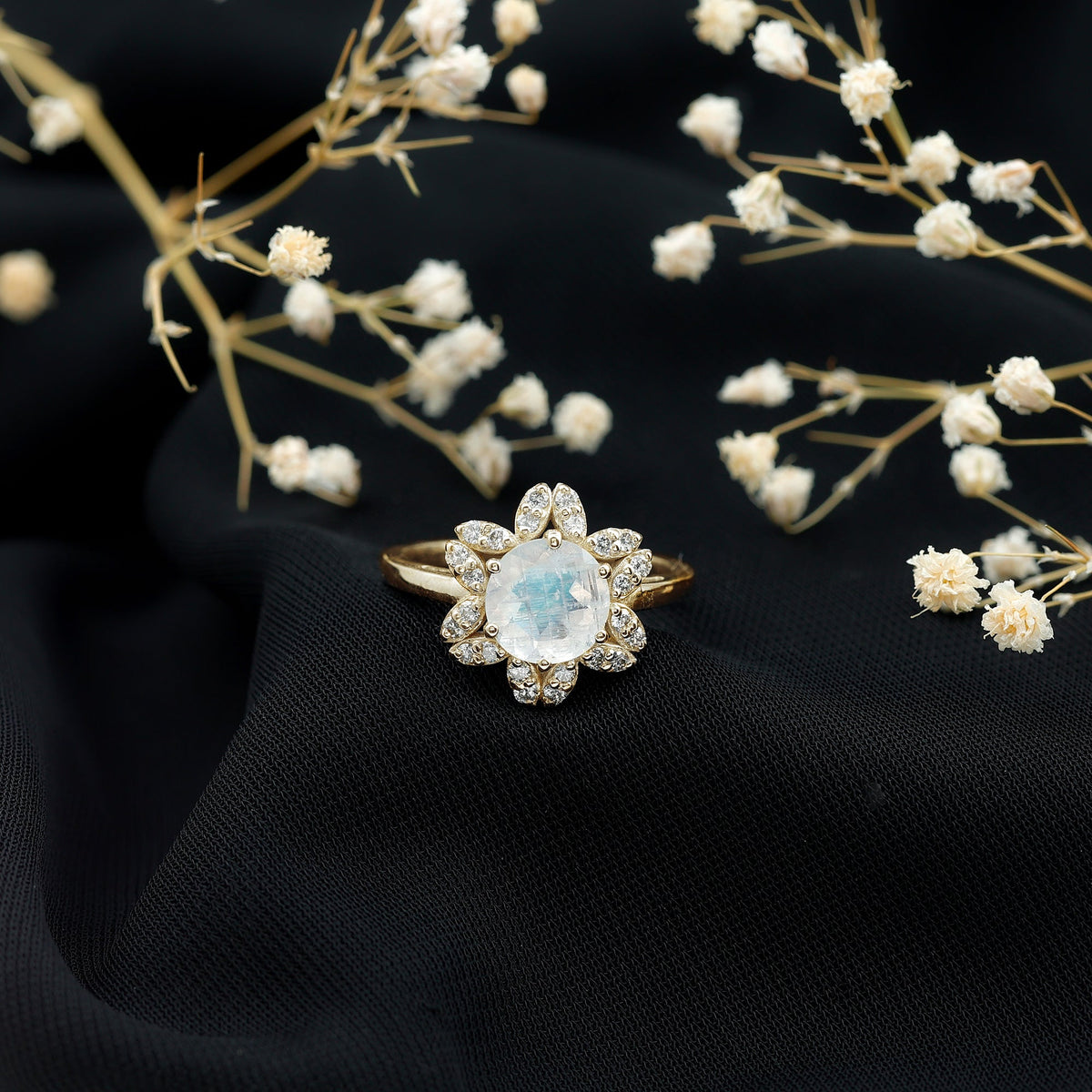Rosec Jewels 0.85 CT moonstone and diamond floral halo engagement ring with intricate detailing and elegant design.