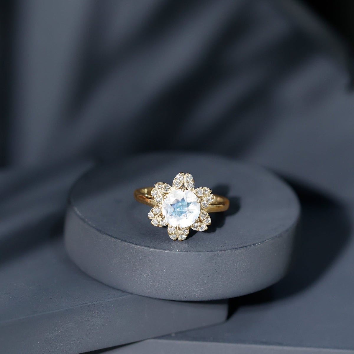0.85 ct moonstone and diamond floral halo engagement ring by Rosec Jewels, featuring delicate floral design and sparkling accents.