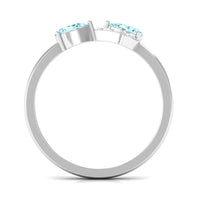 Rosec Jewels 1/2 CT pear-shaped aquamarine infinity promise ring with diamond accents, showcasing elegant gemstone and intricate band design.