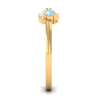 Rosec Jewels 1/2 CT pear-shaped aquamarine infinity promise ring with diamond accents, showcasing elegant gemstone and intricate design.