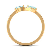 Rosec Jewels 1/2 CT pear-shaped aquamarine infinity promise ring with diamond accents, featuring a delicate band and elegant design.