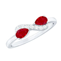 Natural pear-shaped ruby promise ring with diamond accents by Rosec Jewels, showcasing the elegant design and fine craftsmanship.