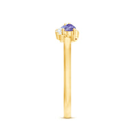 Real Tanzanite and diamond promise ring featuring two stones, crafted by Rosec Jewels, with a sleek band design.