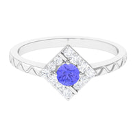 Elegant 3/4 carat Tanzanite and Diamond ring by Rosec Jewels, featuring a minimal design with sparkling gemstones and a sleek band.