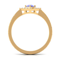 Minimal Tanzanite and diamond ring featuring a 3/4 carat Tanzanite gemstone set in a delicate band, by Rosec Jewels.