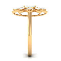 Oval cut moonstone and diamond flower cocktail ring by Rosec Jewels, featuring a delicate floral design with sparkling gemstones.